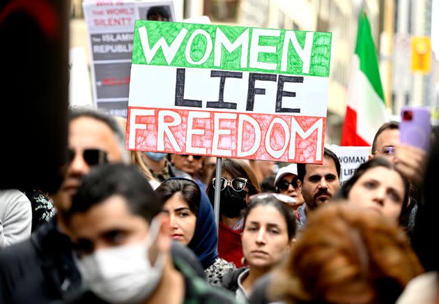 Members of the Iranian community and their supporters rally Sunday in Ottawa in solidarity with protesters in Iran after 22-year-old Mahsa Amini died in police custody. (Photo: Justin Tang/The Canadian Press via AP)