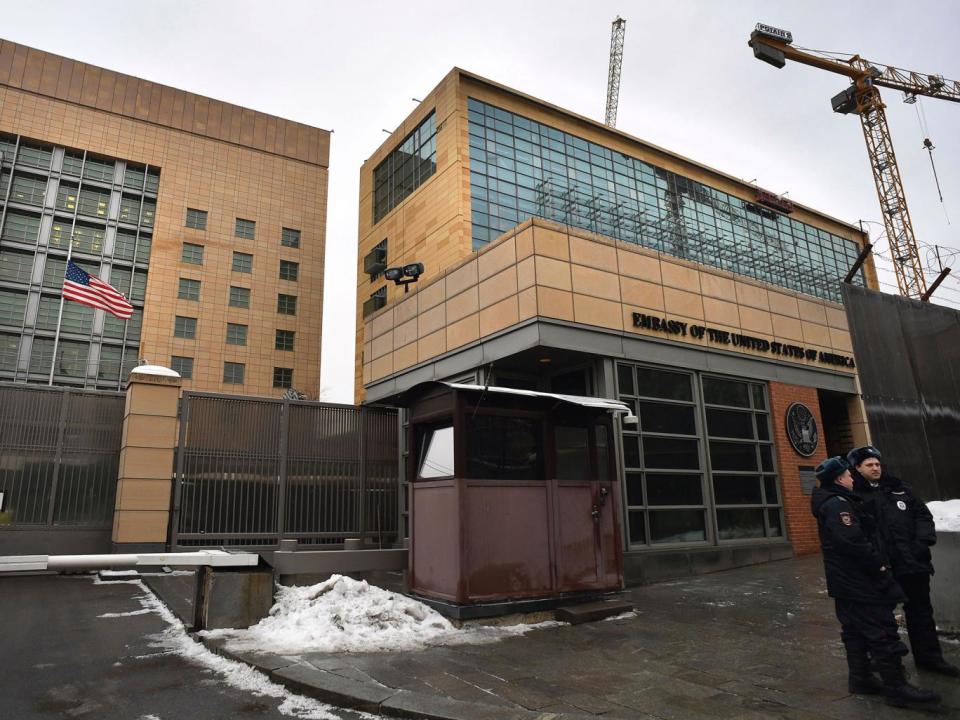 Russian policemen stand guard in front of the US Embassy in Moscow (Getty)