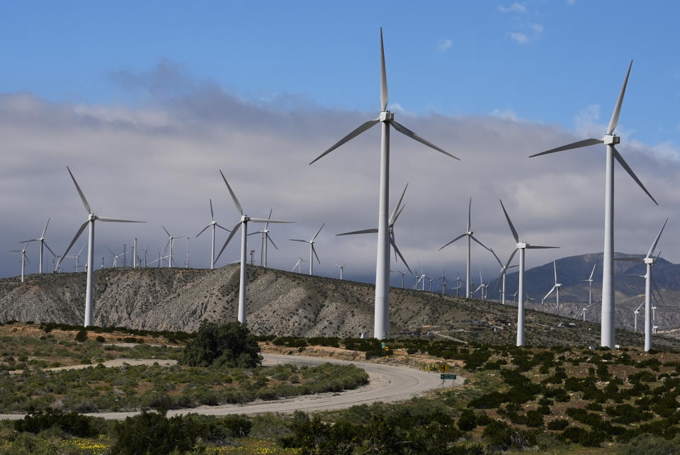 FILE - Wind turbines operate on March 7, 2024, in Palm Springs, Calif. According to a new report published Tuesday, April 16, 2024, last year, marked the best year for new wind projects. (AP Photo/Ashley Landis, File)