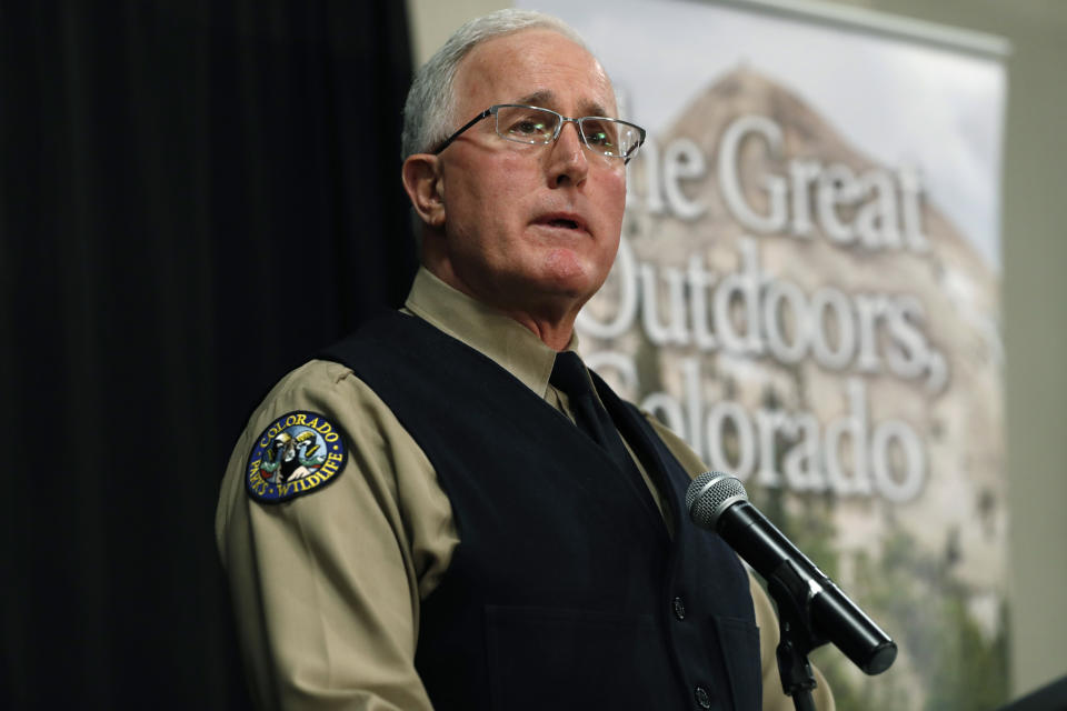 Mark Leslie, manager of the northeast region of Colorado Parks and Wildlife, responds to questions during a news conference Thursday, Feb. 14, 2019, in Fort Collins, Colo., about a runner's encounter with a mountain lion while running a trail just west of Fort Collins last week. (AP Photo/David Zalubowski)