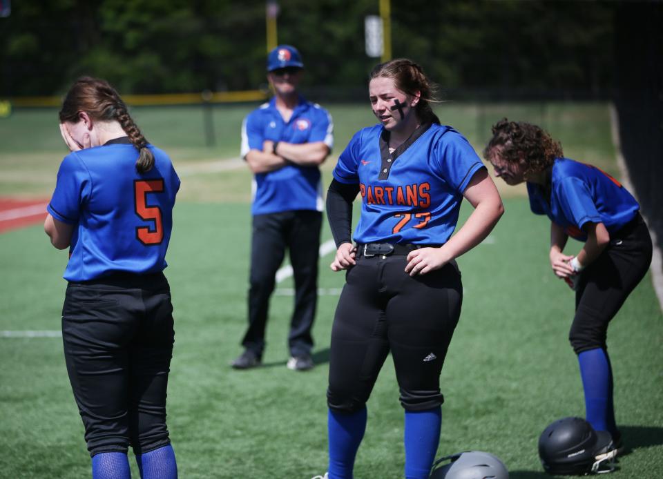 S.S. Seward's softball players console each other after losing to Gowanda in the Class C New York State Softball Championship on June 10, 2023.