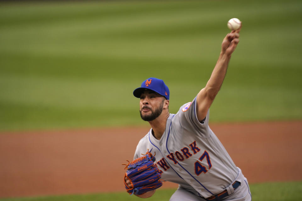 New York Mets starting pitcher Joey Lucchsi delivers a pitch during the first inning of the team's baseball game against the Washington Nationals, Friday, June 18, 2021, in Washington. (AP Photo/Carolyn Kaster)