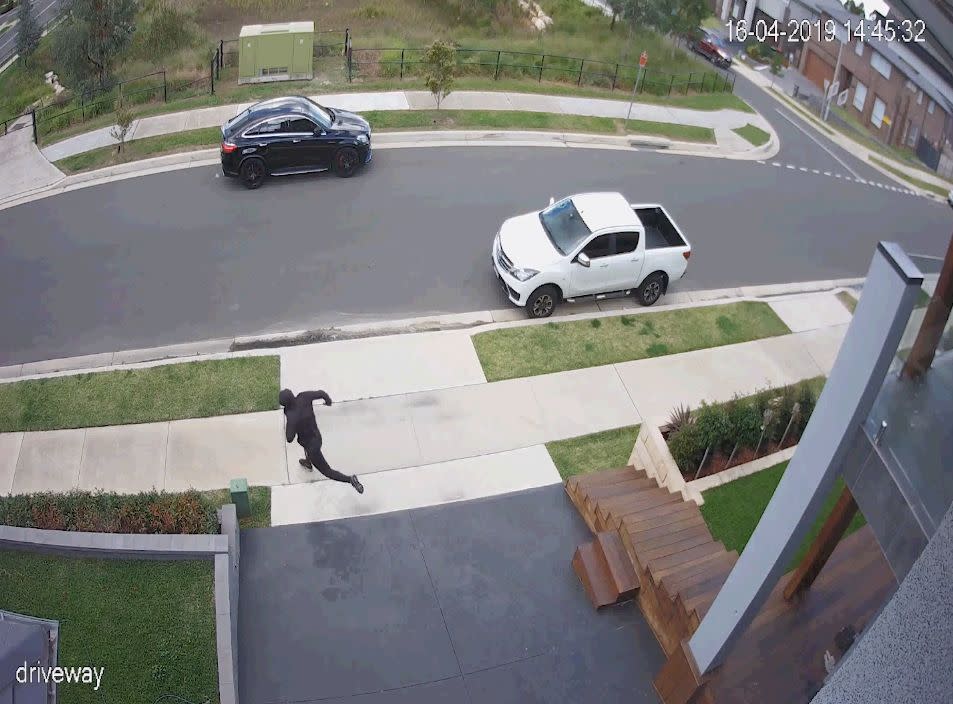 The gunman runs away from the scene. Source: NSW Police