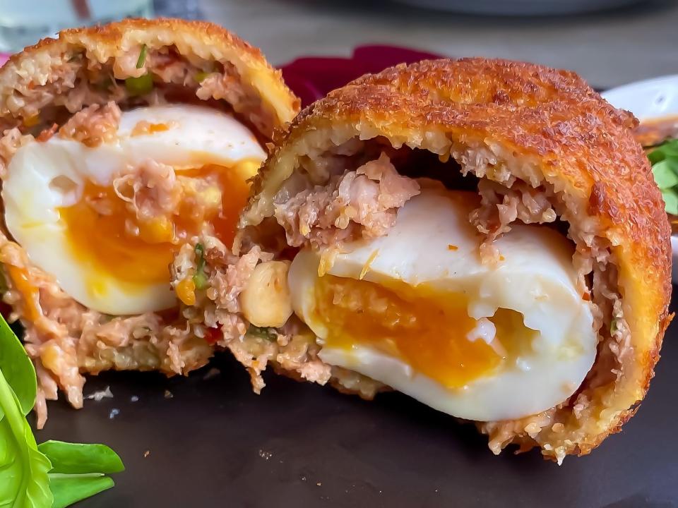 A Scotch egg is a hard-boiled egg covered in sausage meat and breadcrumbs.
