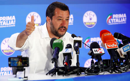 Deputy Prime Minister and League party leader Matteo Salvini speaks to the media at the League party headquarters, following the results of the European Parliament elections, in Milan, Italy May 27, 2019. REUTERS/Alessandro Garofalo