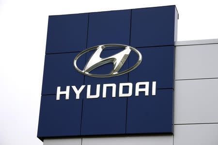 The Hyundai logo is seen outside a Hyundai car dealer in Golden, Colorado, November 3, 2014. REUTERS/Rick Wilking