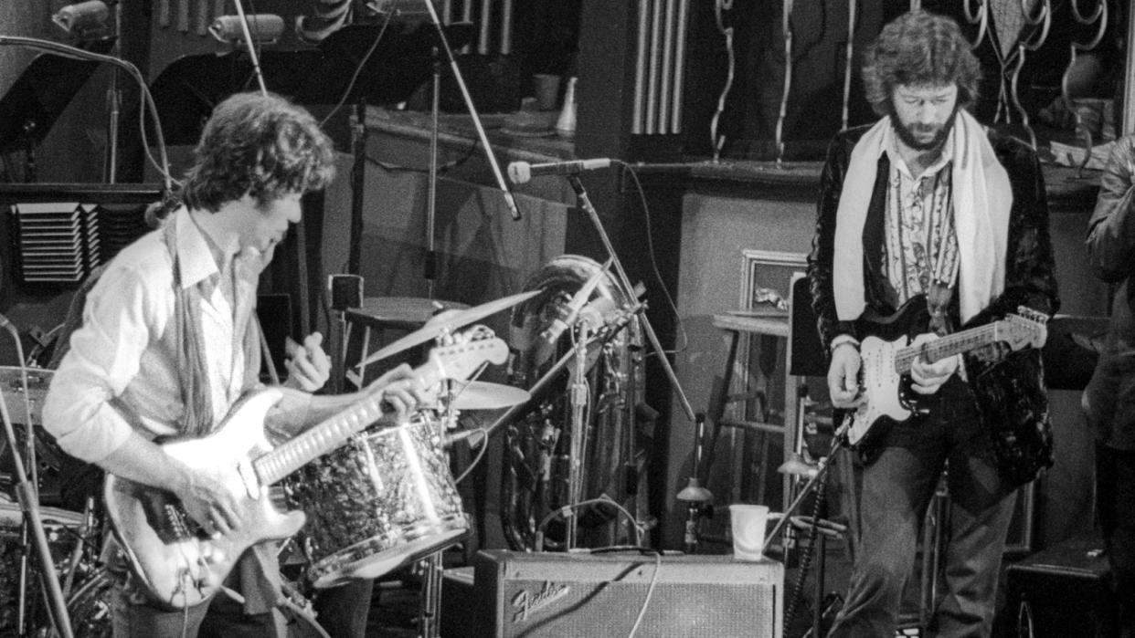  Robbie Robertson (left) and Eric Clapton  perform during The Last Waltz at Winterland on November 25, 1976 in San Francisco, California. 