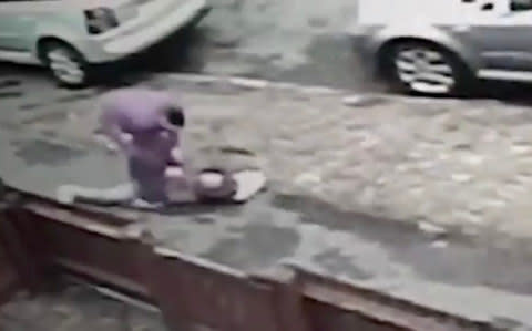 The man is seen hurling the girl to the ground before snatching her rose gold iPhone 6s