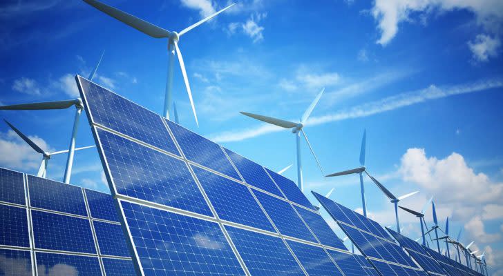 windmills and solar panels that represent esg investing