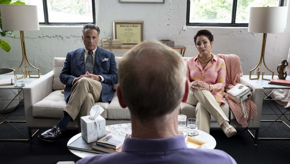 Andy Garcia as Billy and and Gloria Estefan as Ingrid in a marriage counselor's office in the opening scene of 