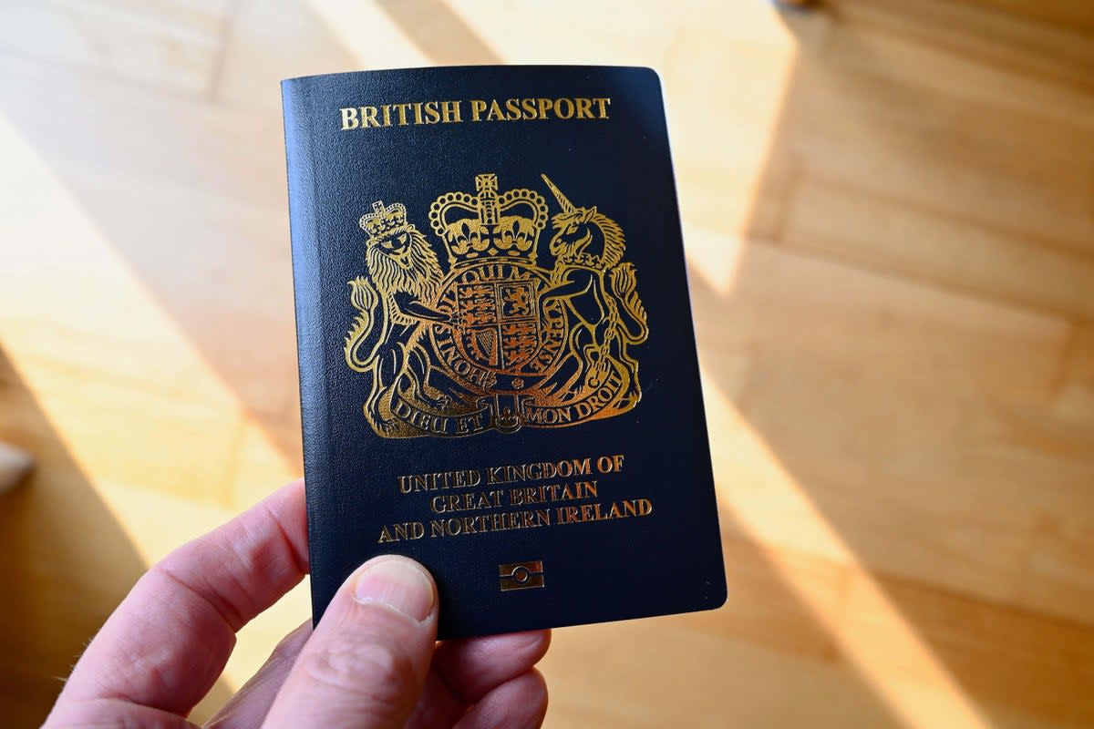 Holidaymakers heading overseas this summer need to allow 10 weeks for a new passport (Anthony Devlin/PA)