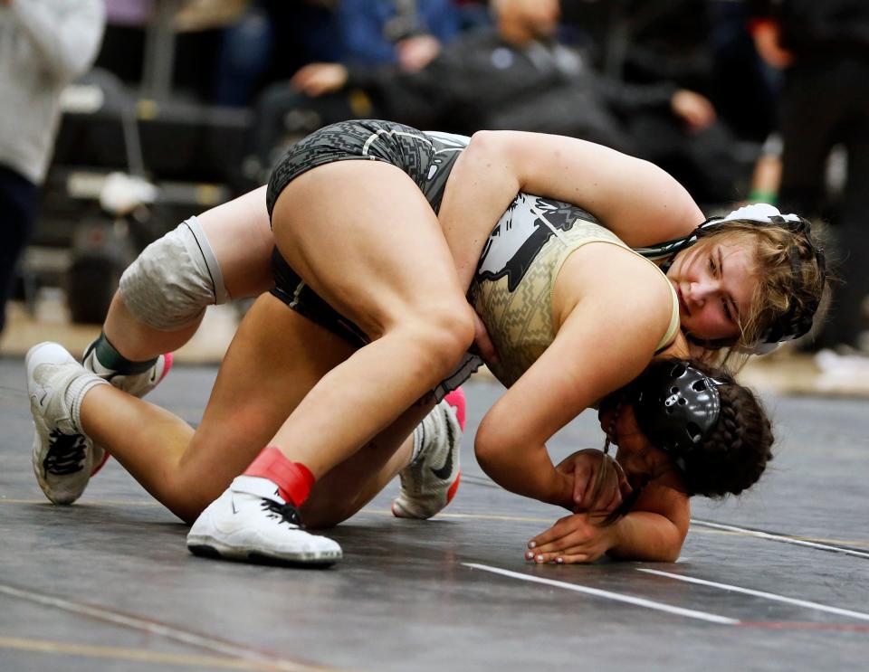 Bremen sophomore Makenzie Shumaker controls Wawasee sophomore Alex Garcia in the 155-pound championship match at the IHSGW girls wrestling semistate Friday, Jan. 5, 2024, at Penn High School in Mishawaka.