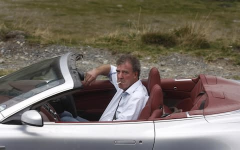 Clarkson with a fag in a Jag