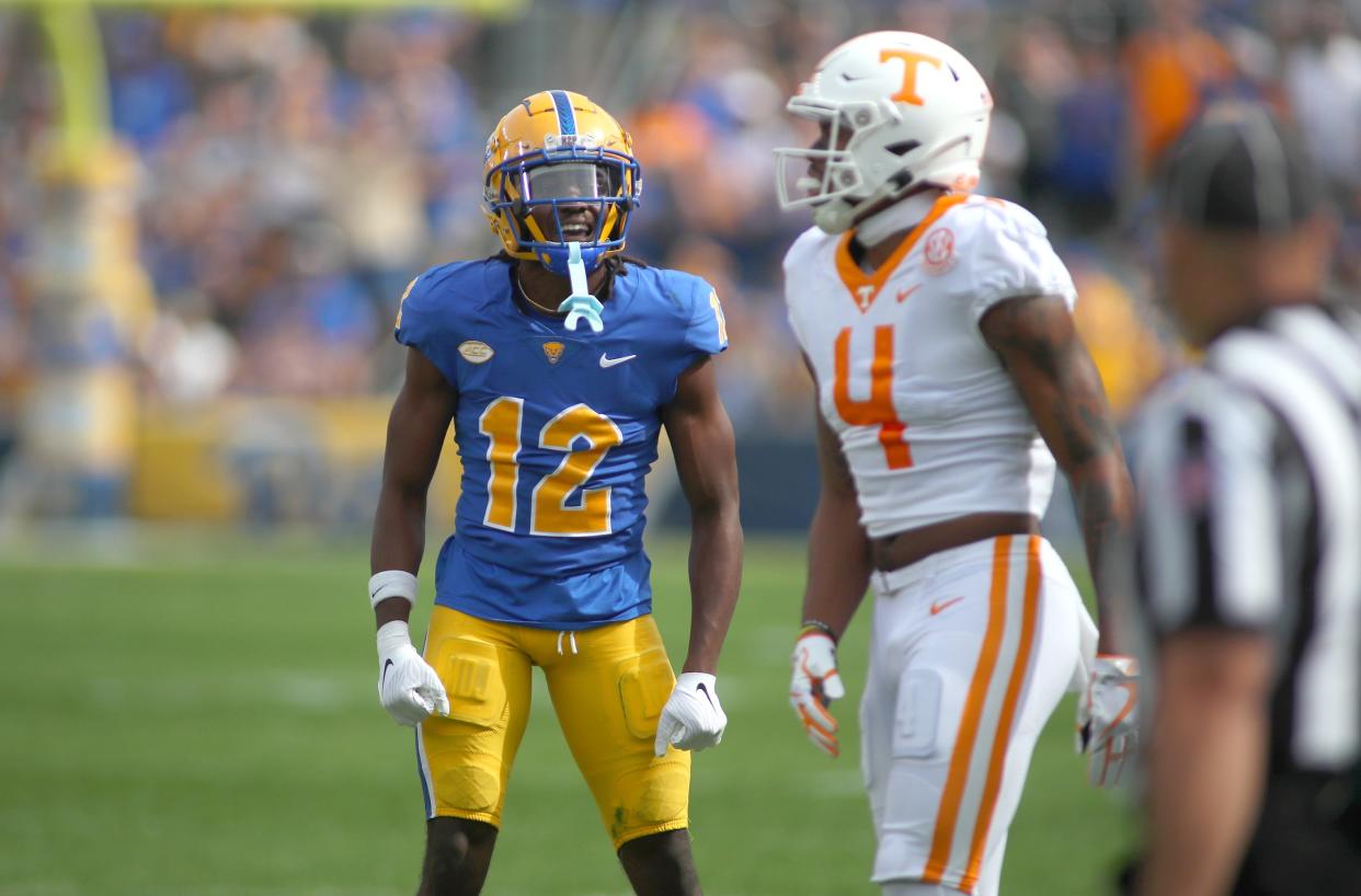 M.J. Devonshire (12) of the Pittsburgh Panthers reacts after knocking the ball away from Cedric Tillman (4) of the Tennessee Volunteers during the first half at Acrisure Stadium in Pittsburgh, PA on September 10, 2022. 