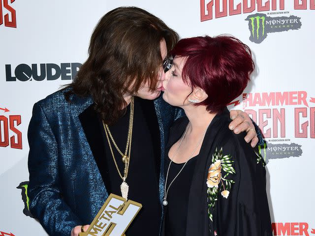 Ian West/PA Images/Getty Ozzy Osbourne with his Golden God award and wife Sharon Osbourne in the press room at the Metal Hammer Golden Gods Awards 2018 held in London.