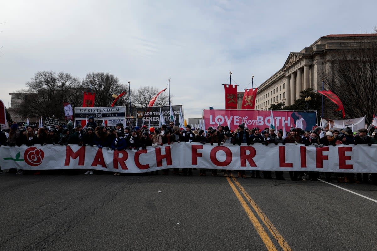 Anti-abortion activists march during the 49th annual March for Life rally on the National Mall on January 21, 2022 in Washington, DC. The rally draws activists from around the country who are calling on the U.S. Supreme Court to overturn the Roe v. Wade decision that legalized abortion nationwide.  (Getty Images)