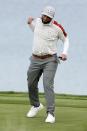 Team Europe's Jon Rahm reacts after making a putt on the 16th hole during a four-ball match the Ryder Cup at the Whistling Straits Golf Course Saturday, Sept. 25, 2021, in Sheboygan, Wis. (AP Photo/Jeff Roberson)