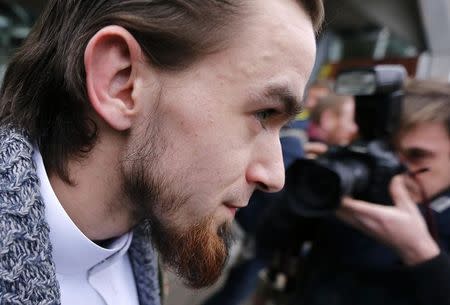 Michael Delefortrie, who is convicted of being part of "Sharia4Belgium", leaves after the verdict is delivered in a trial of the group in Antwerp February 11, 2015. REUTERS/Francois Lenoir