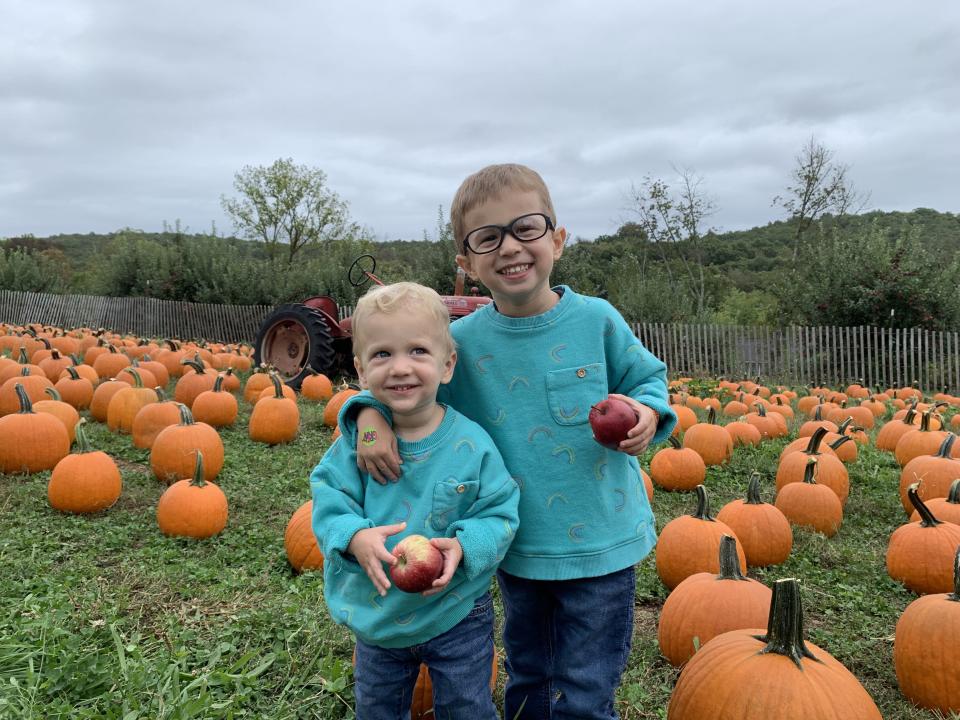 Hunter and Paxton in pumpkin patch