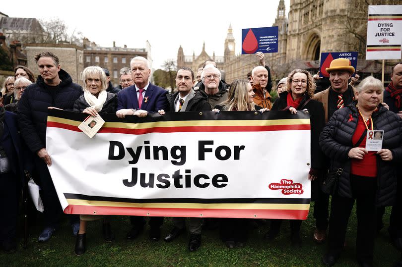 Infected blood victims and campaigners protest on College Green in Westminster, London calling for action on compensation payments for victims of the infected blood scandal. Picture date: Wednesday February 28, 2024.