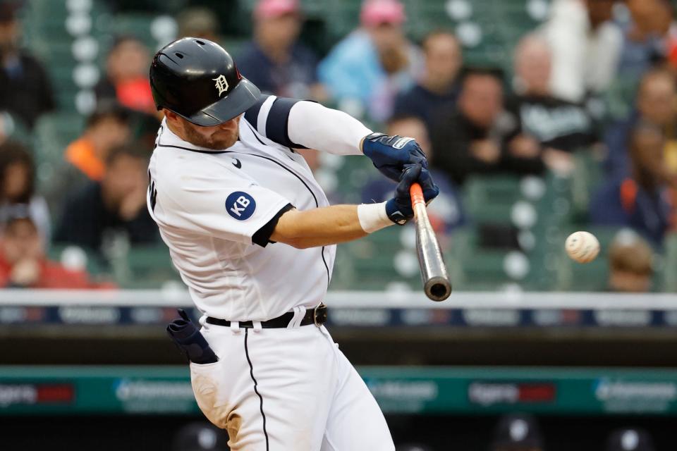 Detroit Tigers left fielder Robbie Grossman (8) hits a double in the second inning against the Cleveland Guardians at Comerica Park in Detroit on Thursday, May 26, 2022.