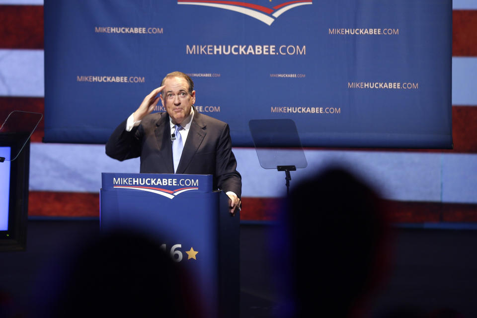 Former Arkansas Gov. Mike Huckabee salutes supporters in Hope, Ark., after announcing Tuesday, May 5, 2015, that he is seeking the Republican nomination in the race for president.