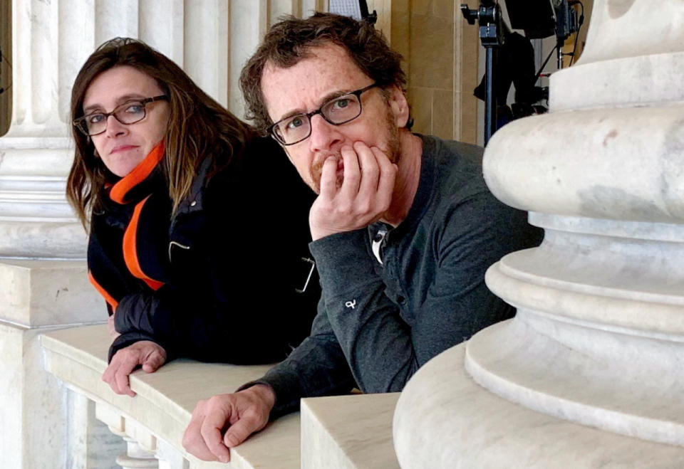 Tricia Cooke and Ethan Coen on the set of “Drive-Away Dolls”