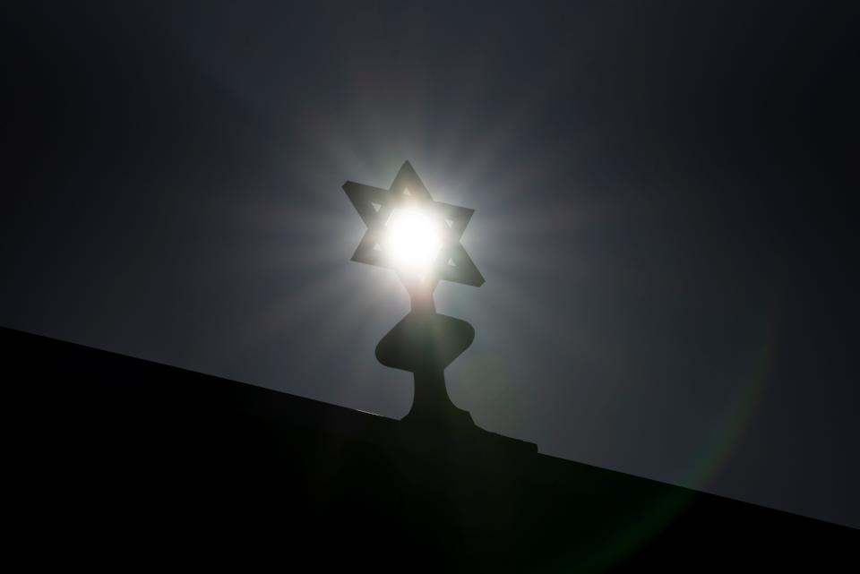 The sun shines through the Star of David on top of the Congregation Ahavas Israel on Van Houten Avenue in Passaic on Saturday, April 3, 2021. Amid a rise in antisemitism, New York's Yeshiva University and the Yad Vashem Holocaust remembrance center in Israel are collaborating to develop new teacher training resources about the Jewish genocide during World War II.