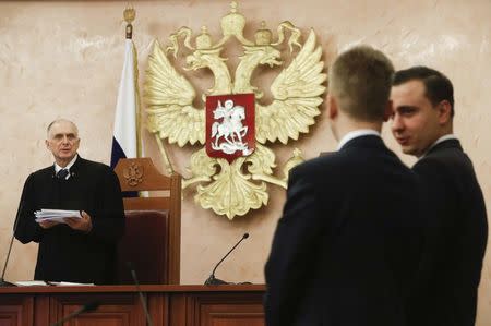 Judge Nikolai Romanenkov (L) of the Supreme Court attends a hearing on an appeal by Russian opposition leader Alexei Navalny against a decision to bar him from taking part in the 2018 presidential election in Moscow, Russia December 30, 2017. REUTERS/Sergei Karpukhin