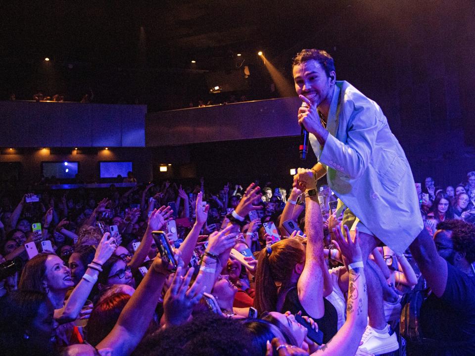 Singer MAX performs in front of a crowd at Official Lollapalooza Aftershow