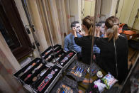 Viorel, a Romanian inmate, gets his make up applied before performing in the State of Siege, by French author Albert Camus, a play describing the arrival of plague in Spain which brings a totalitarian regime to power, at the Nottara Theatre in Bucharest, Romania, Wednesday, Nov. 24, 2021. (AP Photo/Andreea Alexandru)