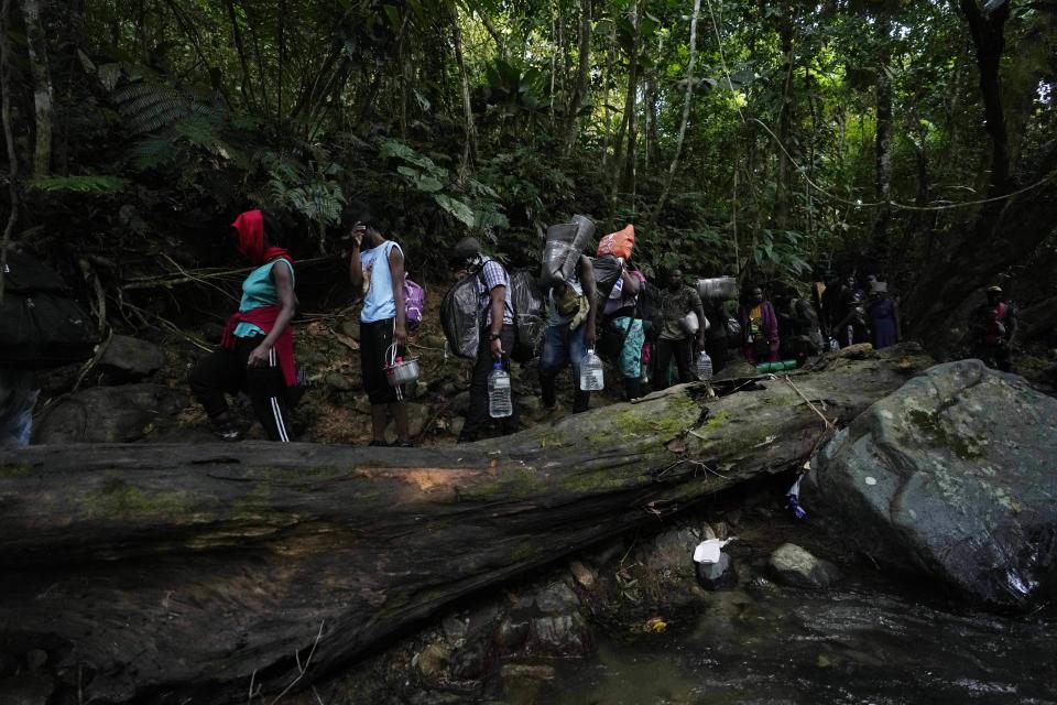 Migrants continue on their trek north, near Acandi, Colombia, Wednesday, Sept. 15, 2021. The migrants, mostly Haitians, are on their way to crossing the Darien Gap from Colombia into Panama dreaming of reaching the U.S. (AP Photo/Fernando Vergara)