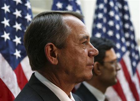 U.S. Speaker of the House John Boehner (R-OH) (L) and Rep Eric Cantor (R-VA) (R) attend a news conference with Republican House members in Washington October 10, 2013. REUTERS/Gary Cameron