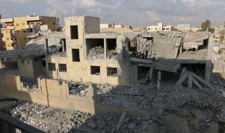 A general view shows a school for the deaf and mute, destroyed in what activists said were overnight U.S.-led air strikes against the Islamic State, in Raqqa November 24, 2014. REUTERS/Nour Fourat