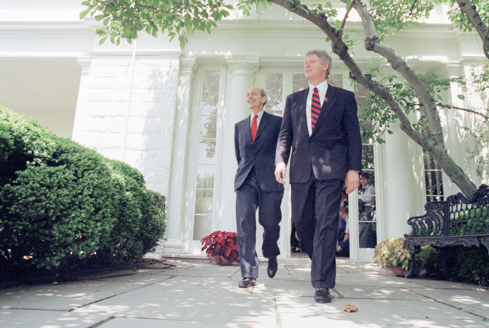 FILE - In this May 16, 1994, file photo President Bill Clinton and his Supreme Court nominee Stephen Breyer leave the White House in Washington, for the Rose Garden where the President officially introduced Breyer to the nation. Breyer said in a letter to President Joe Biden that his retirement will take effect on Thursday, June 30, 2022, at noon, after nearly 28 years on the nation’s highest court. (AP Photo/Doug Mills, File)