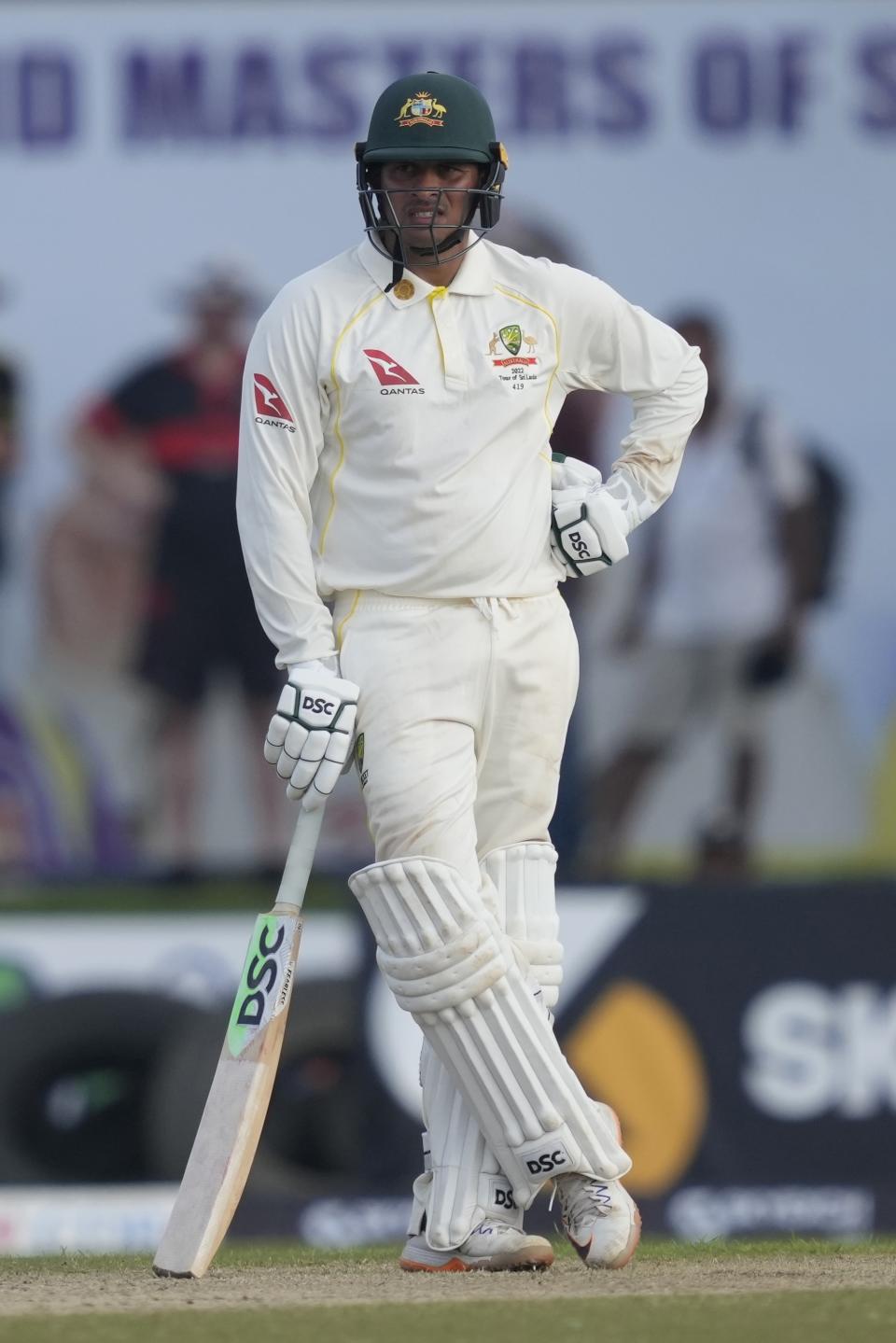 Australia's Usman Khawaja stands in the field during the day one of their first test cricket match with Sri Lanka in Galle, Sri Lanka, Wednesday, June 29, 2022. (AP Photo/Eranga Jayawardena)