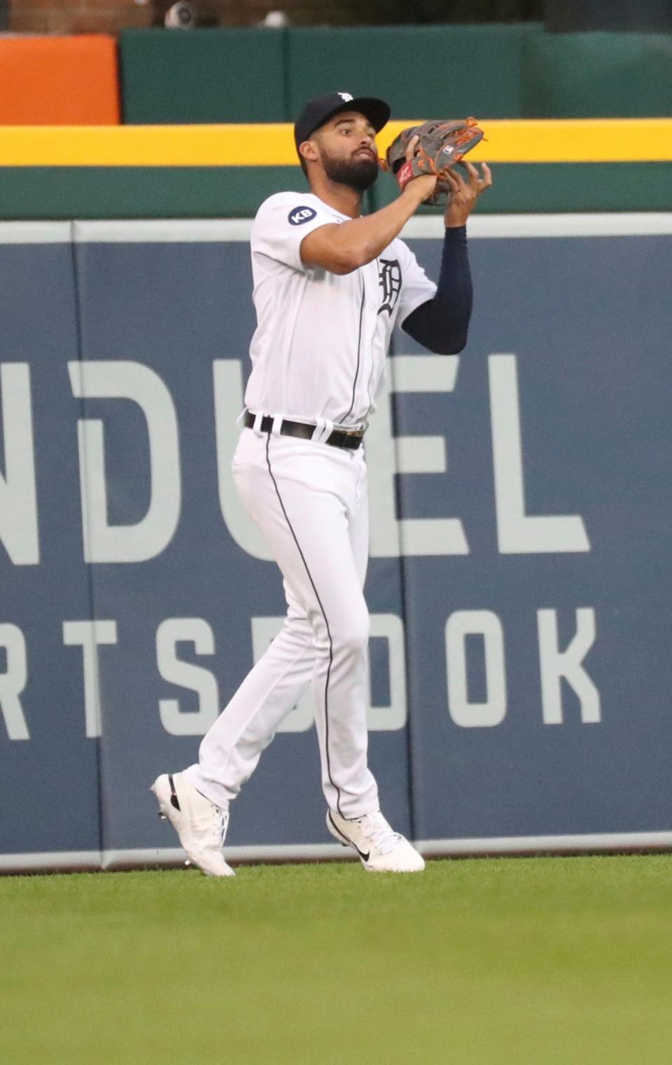 Detroit Tigers center fielder Riley Greene catches a fly ball hit by Kansas City Royals second baseman Nicky Lopez (8) during third-inning action at Comerica Park in Detroit on Friday, July 1, 2022.