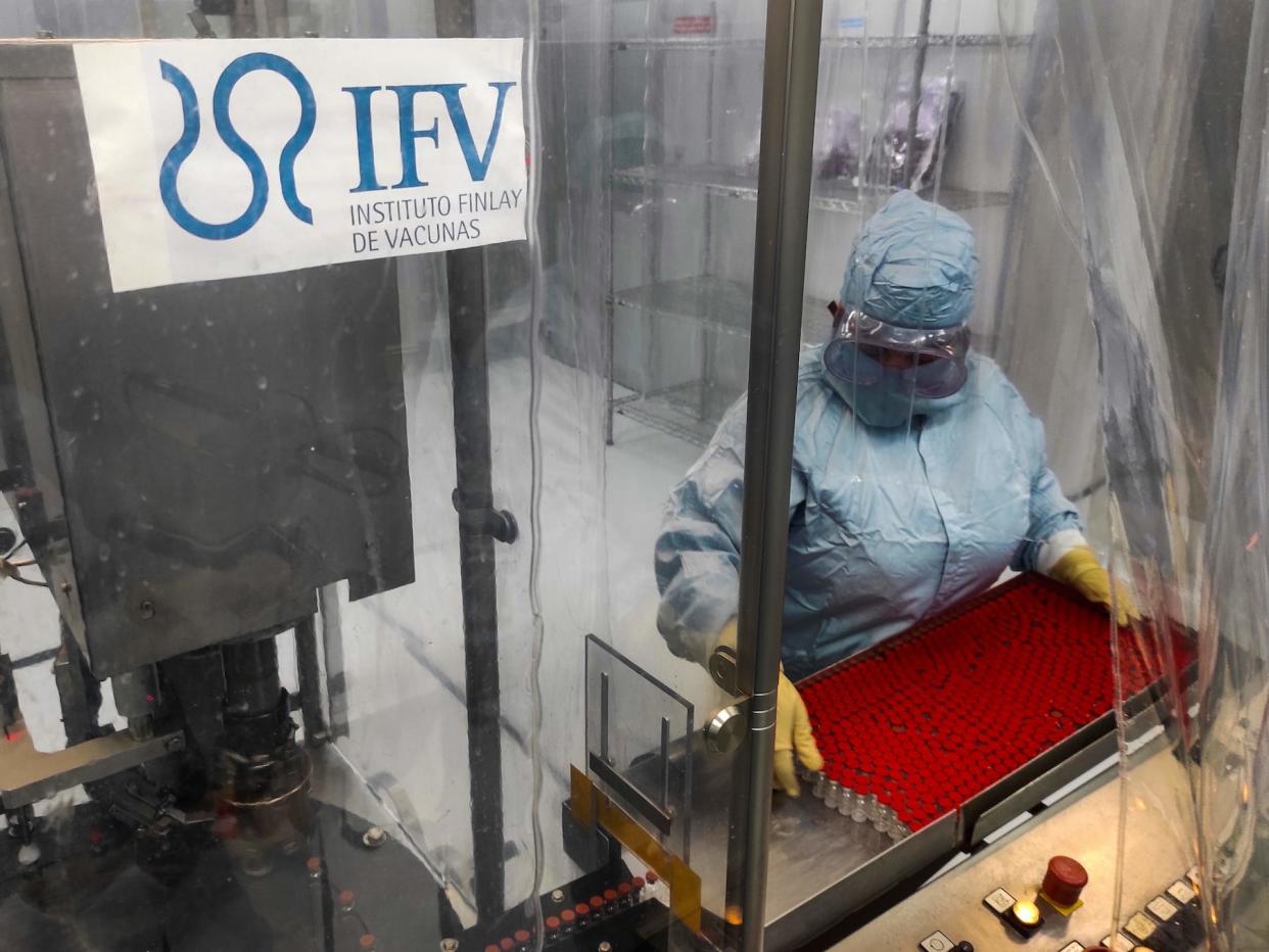 Technician Mayelin Mejias works at a vaccine processing plant at the Finlay Vaccine Institute in Havana, on January 20, 2021.