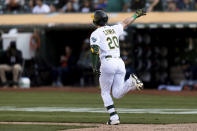 Oakland Athletics' Mark Canha gestures after hitting an RBI for a walk-off win against the Houston Astros in the ninth inning of a baseball game in Oakland, Calif., Sunday, Sept. 26, 2021. (AP Photo/John Hefti)