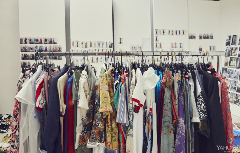  Stella Jean’s vibrant clothes hang on a rack in her studio.