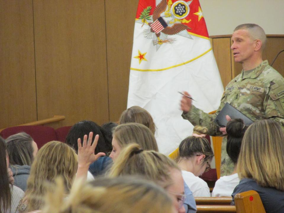 Sgt. Maj. of the Army Michael Grinston talks to families of deployed 82nd Airborne Division paratroopers during a town hall meeting in the All American Chapel at Fort Bragg.