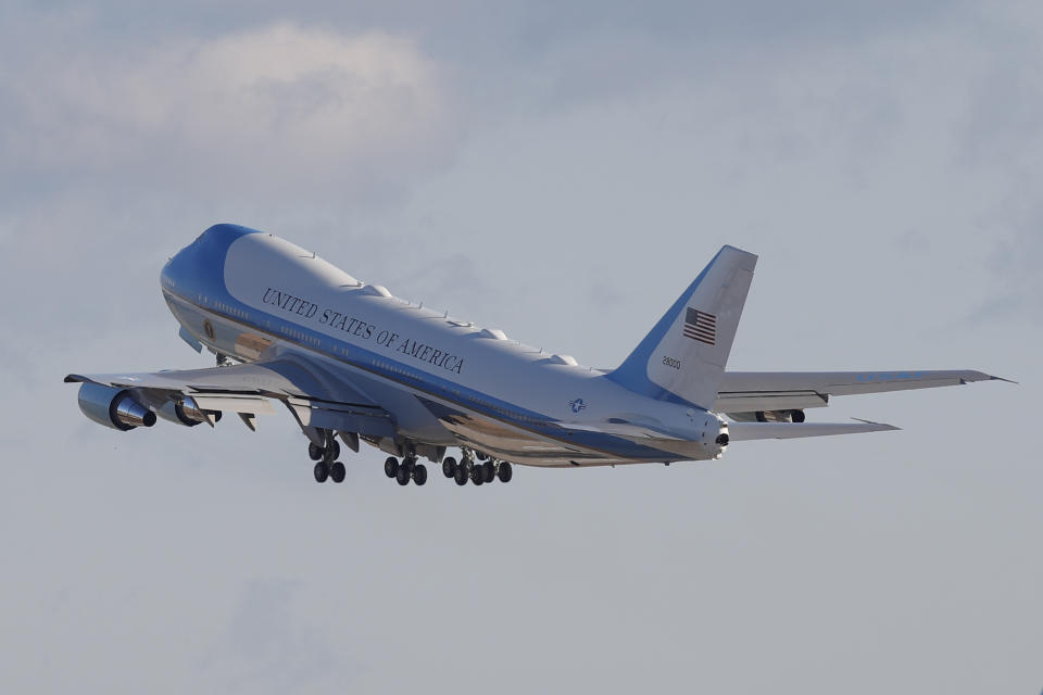 Air Force One with President Donald Trump and the first family on board, departs Andrews Air Force Base, Md., Wednesday, Jan. 20, 2021.(AP Photo/Luis M. Alvarez)