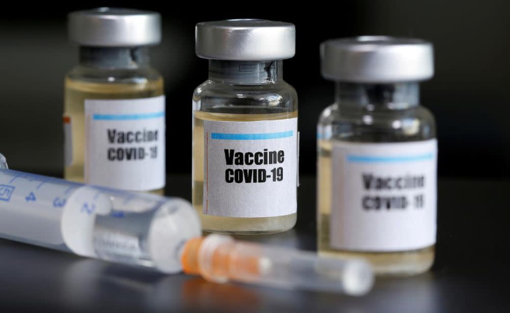 Small bottles labelled with a ‘Vaccine Covid-19’ sticker and a medical syringe are seen in this illustration taken April 10, 2020. — Reuters pic