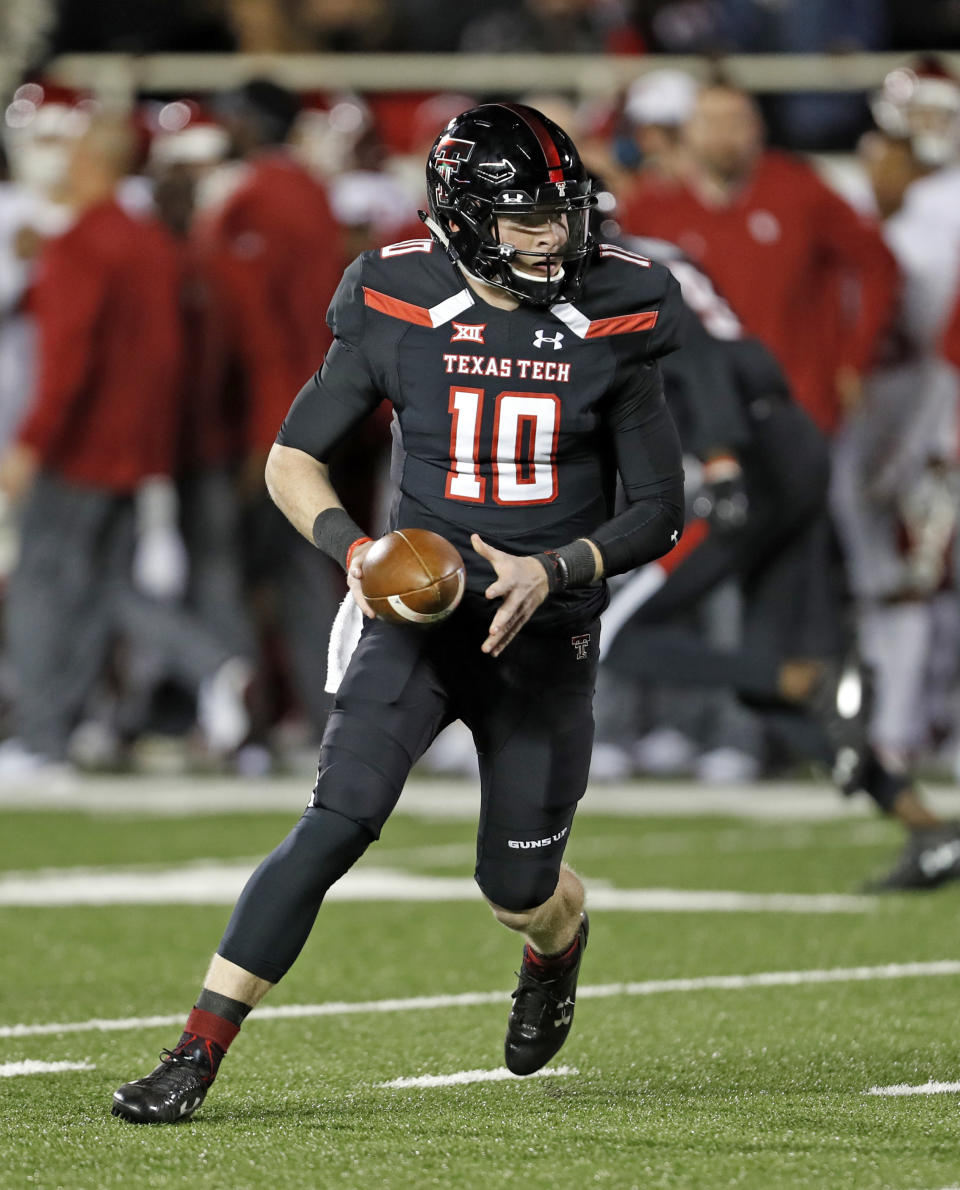 Texas Tech's Alan Bowman (10) runs with the ball during the first half of an NCAA college football game against Oklahoma, Saturday, Nov. 3, 2018, in Lubbock, Texas. (AP Photo/Brad Tollefson)