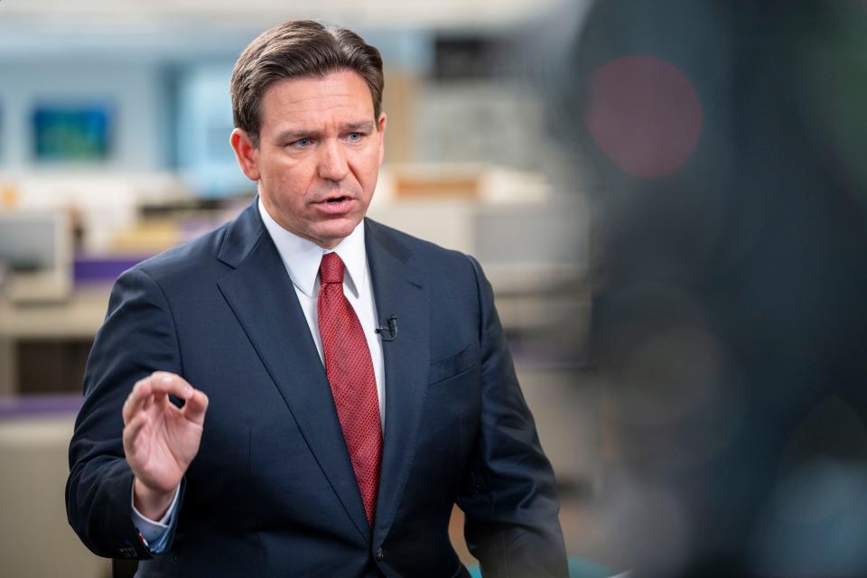 Republican presidential candidate Florida Gov. Ron DeSantis sits for an interview with Brianne Pfannenstiel of the Des Moines Register and Dasha Burns of NBC News in the Des Moines Register Newsroom, Thursday, Jan. 4, 2024.