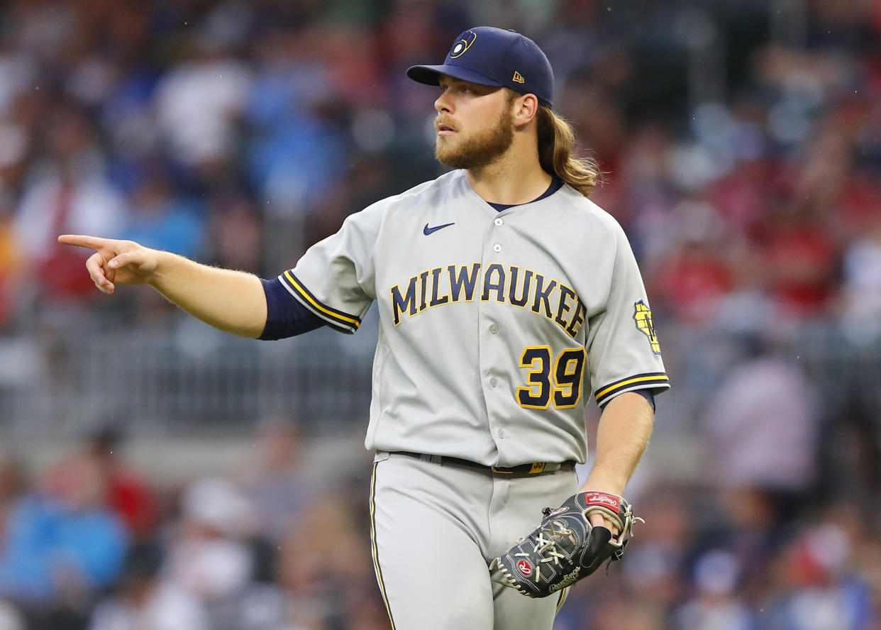 ATLANTA, GA - JULY 30: Corbin Burnes #39 of the Milwaukee Brewers reacts in the first inning of an MLB game against the Atlanta Braves at Truist Park on July 30, 2021 in Atlanta, Georgia. (Photo by Todd Kirkland/Getty Images)