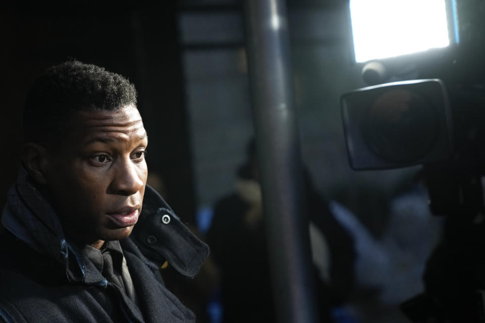 Jonathan Majors leaves the Manhattan criminal courthouse in New York, Monday, Dec. 18, 2023. Majors was convicted of assaulting his former girlfriend during a confrontation in New York City earlier this year. A Manhattan jury convicted the Marvel star Monday of one misdemeanor assault charge and one harassment violation. (AP Photo/Seth Wenig)