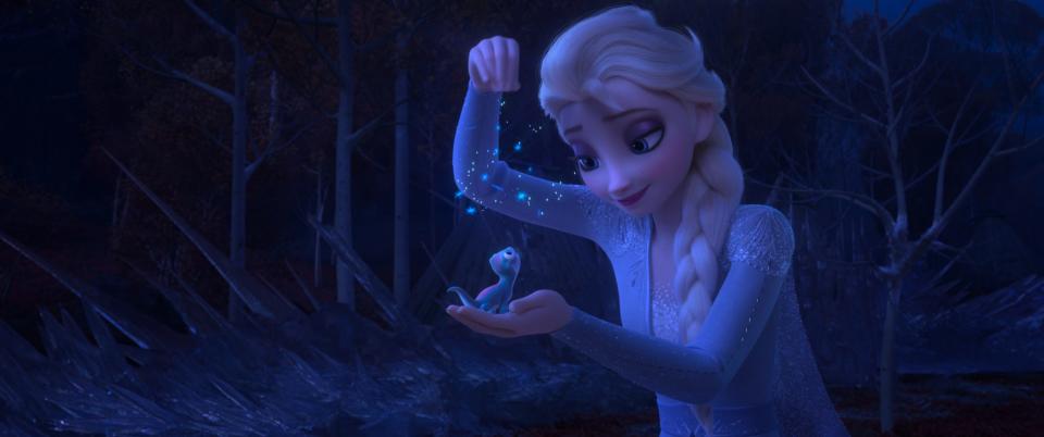 Elsa plays with Bruni, a salamander, in the movie "Frozen 2."