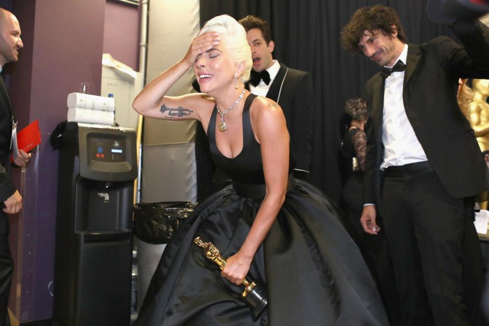 Lady Gaga poses with the Music (Original Song) award for 'Shallow' from 'A Star Is Born' backstage during the 91st Annual Academy Award (A.M.P.A.S vis Getty Images)