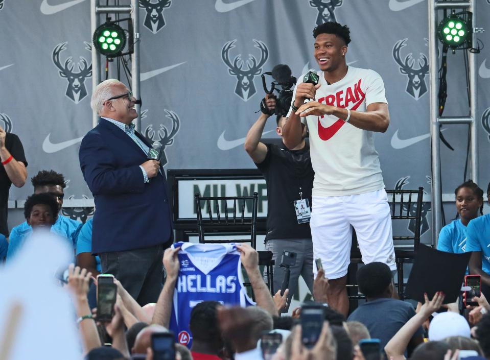 July 14, 2019 Photographs from the Giannis MVP Celebration on the plaza at Fiserv Forum.  Here Milwaukee Buck’s Giannis Antetokounmpo answers questions from broadcaster Jim Paschke, The Voice of the Bucks at left.Michael Sears/Milwaukee Journal Sentinel